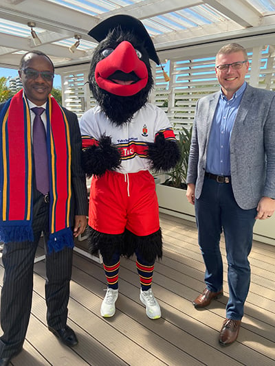UP Vice-Chancellor Professor Tawana Kupe with the University's mascot bateleur eagle provisionally named Masey and TuksSport Director Steven Ball.