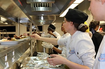 Students prepare food 