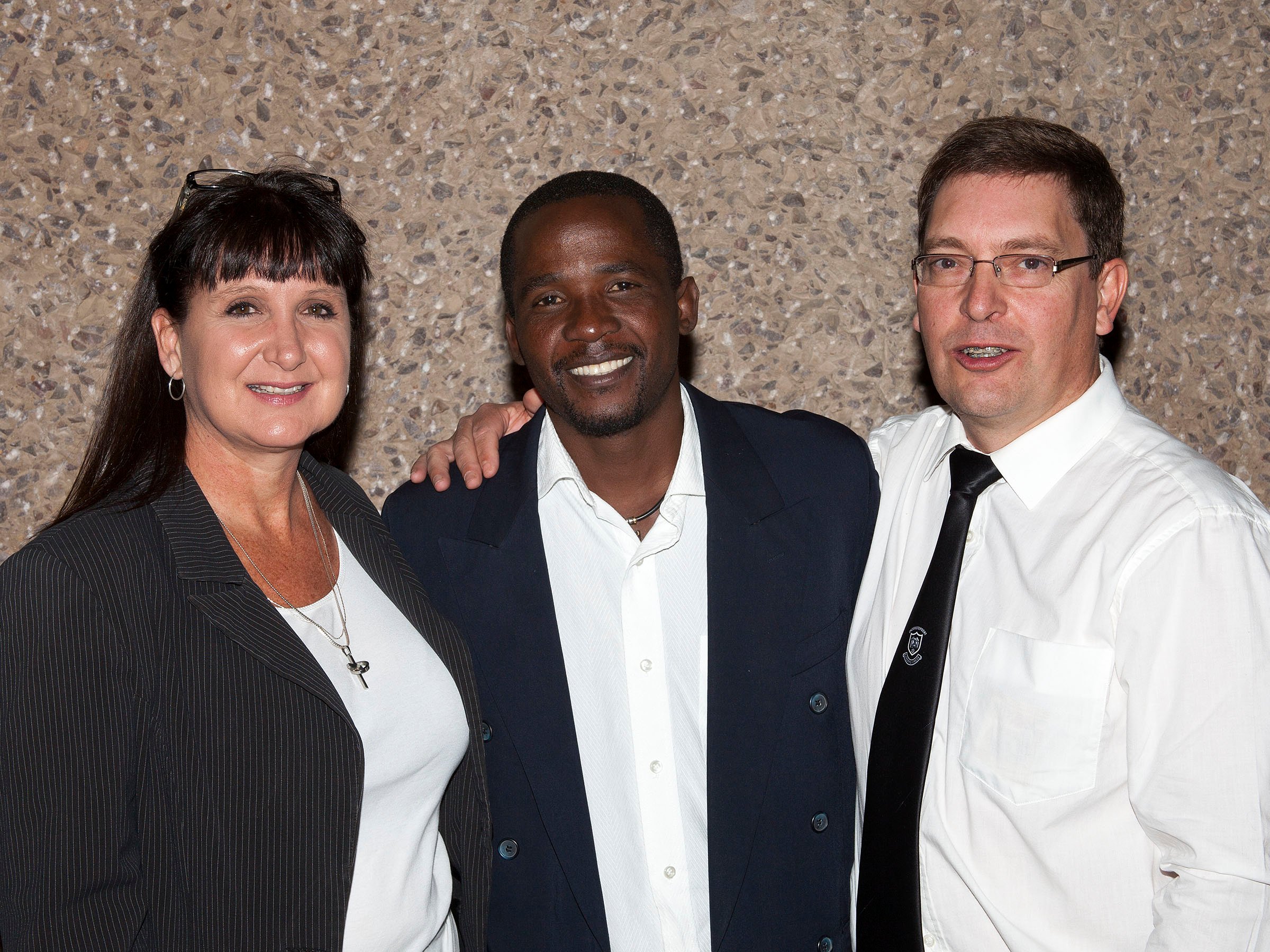 Prof Linda van Ryneveld, Sibusiso Vilane and Craig Murdoch afer Sibusiso's presentation