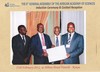 Prof Lubuma receives his certificate as Fellow of the African Academy of Sciences