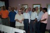 Prof Lafforgue with members of staff in the tea room