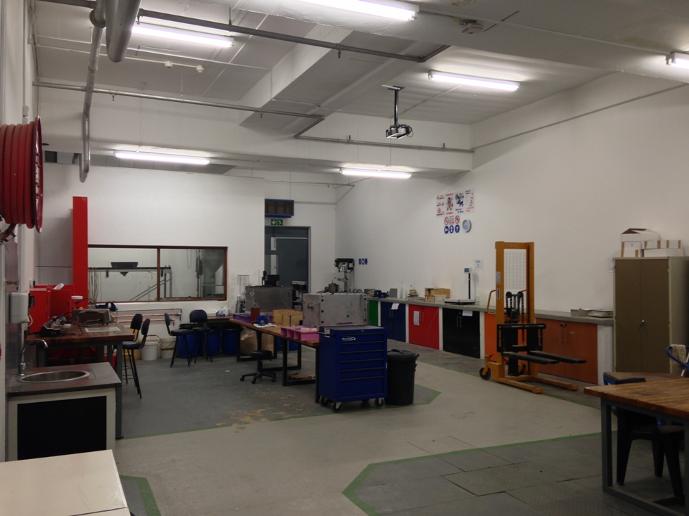 Laboratory floor area with model preparation room in the background (left).