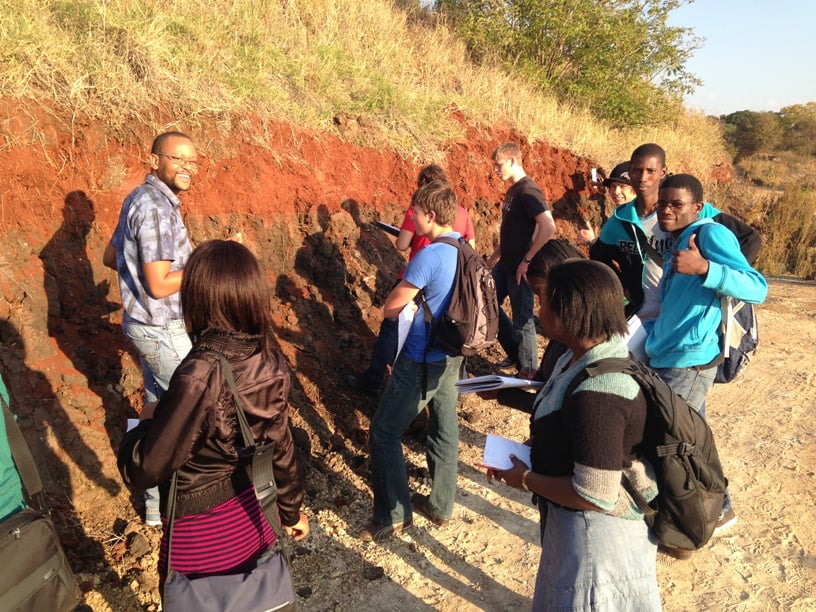 Mr Winston Nxumalo from Jones & Wagener (left) explaining the soil profile