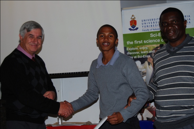 University of Pretoria student Bongumenzi Nxumalo receives the  2012 Hanisch prize for  outstanding achievement in archaeology at postgraduate level, with Prof. Innocent Pikirayi on  the  right