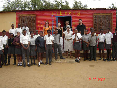 Students and kids infront of library