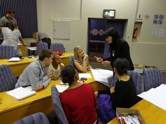 Ms Bardien Pienaar (on the right) discussing the business scenario during her guest lecture to the BComHons (Marketing Management) students.
